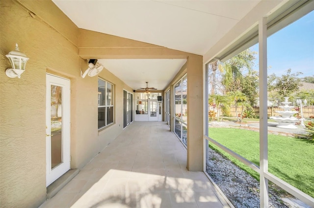 view of patio featuring ceiling fan