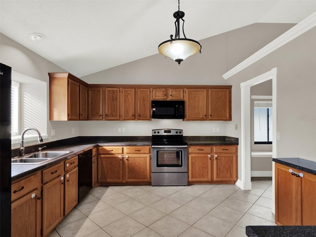 kitchen featuring black appliances, sink, hanging light fixtures, and lofted ceiling