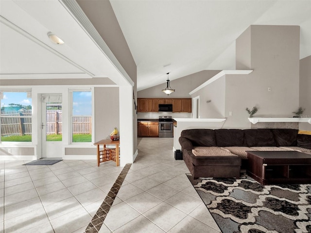 tiled living room with lofted ceiling