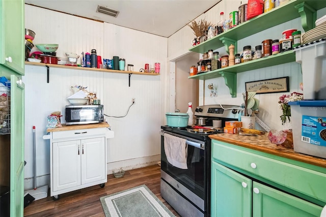 kitchen with dark hardwood / wood-style floors and stainless steel appliances