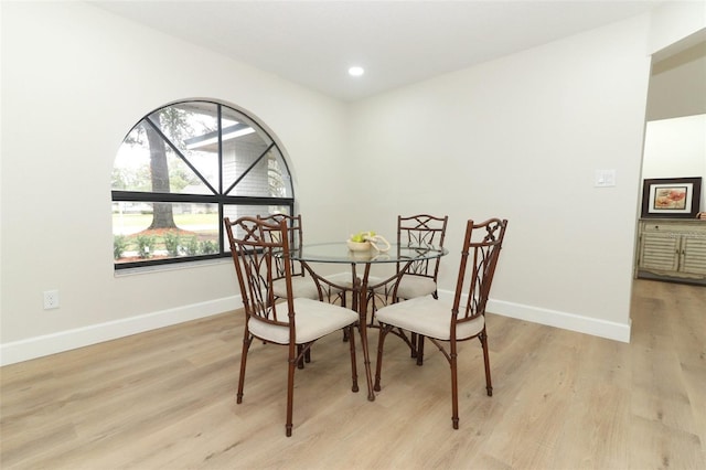 dining area with light wood-type flooring