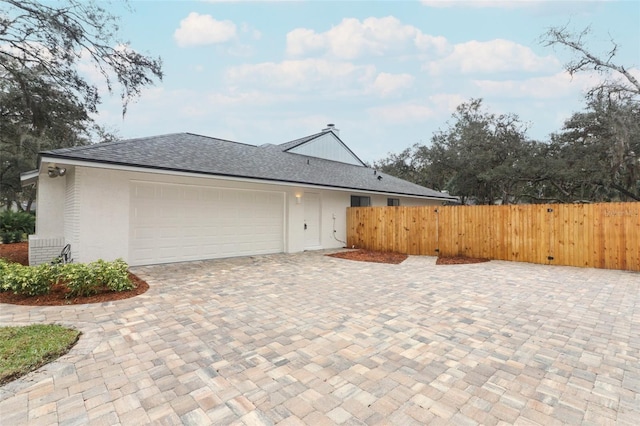 view of front of home with a garage