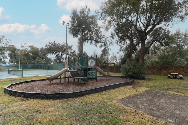 view of playground with tennis court