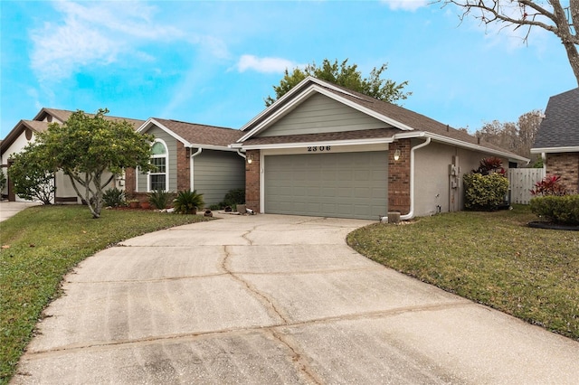 ranch-style home with a garage and a front yard