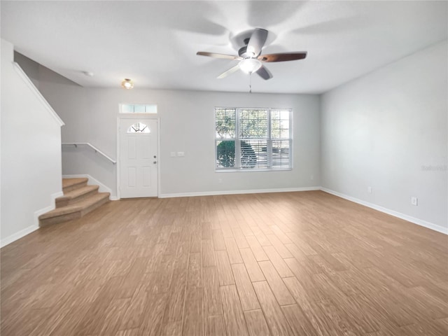 interior space featuring ceiling fan and light wood-type flooring