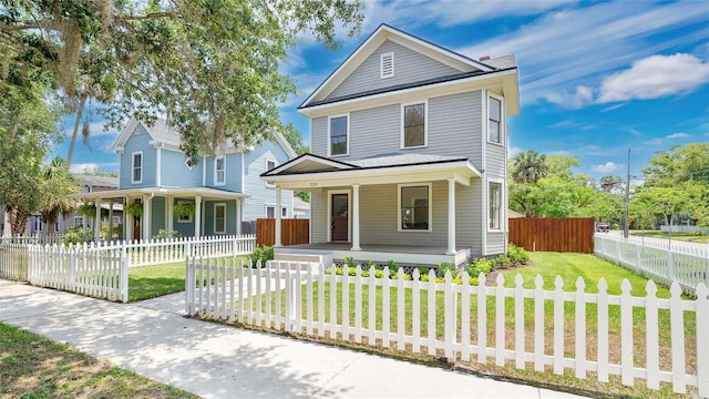 219 Laurel Ave, Sanford, FL 32771 - view of front of house featuring a porch
