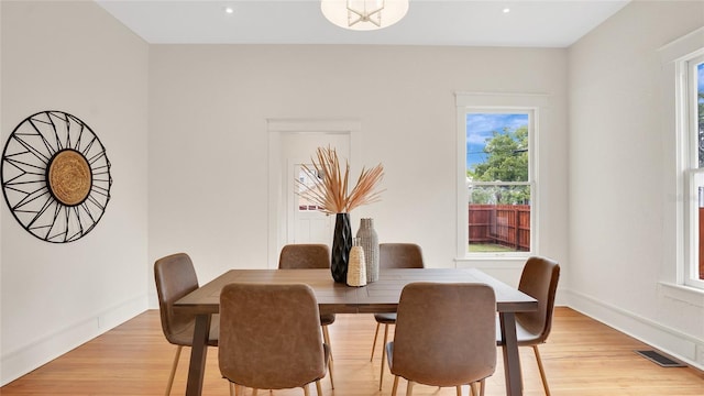 219 Laurel Ave, Sanford, FL 32771 - dining area featuring plenty of natural light, light wood-style floors, recessed lighting, and baseboards