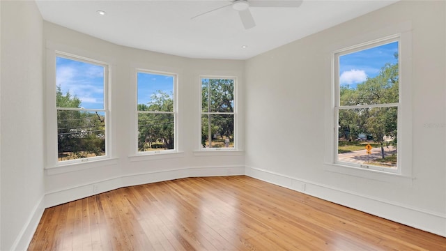 219 Laurel Ave, Sanford, FL 32771 - spare room with light wood-style floors, a ceiling fan, and baseboards