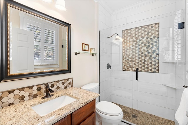 bathroom featuring vanity, an enclosed shower, ornamental molding, decorative backsplash, and toilet