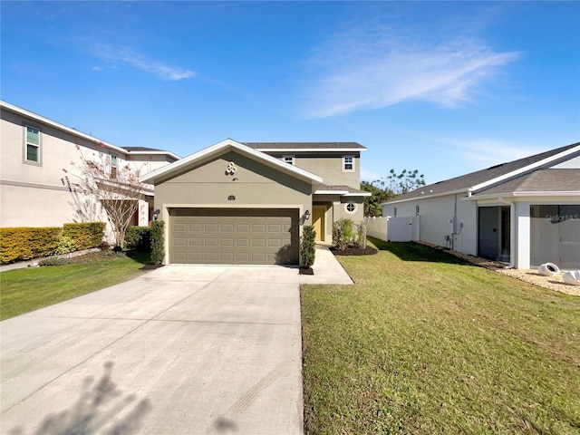 view of front of home featuring a front lawn and a garage