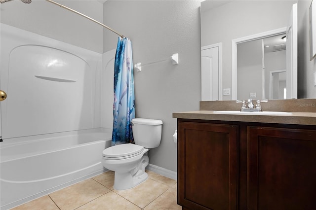 full bathroom with vanity, toilet, shower / bath combo with shower curtain, and tile patterned flooring