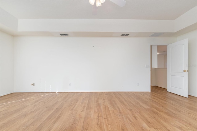 unfurnished room featuring ceiling fan and light hardwood / wood-style floors