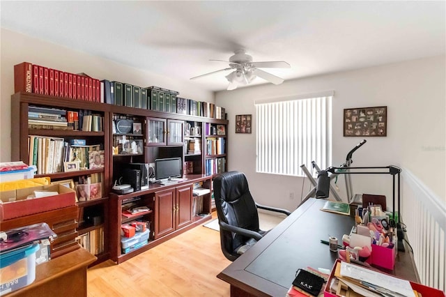 office area with ceiling fan and light wood-type flooring