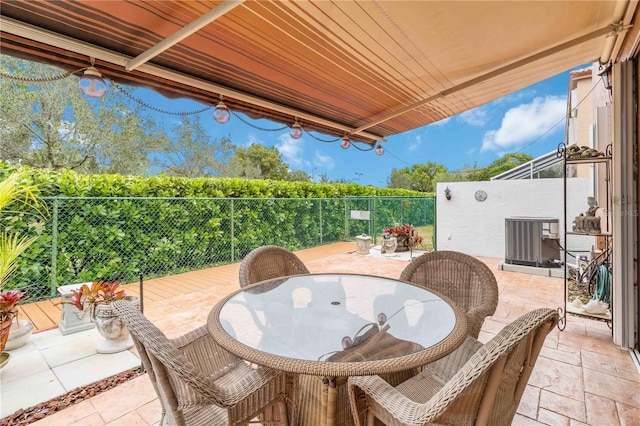 view of patio / terrace with central AC unit