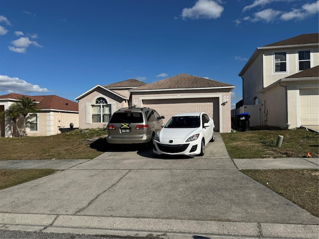 view of front of property with a garage