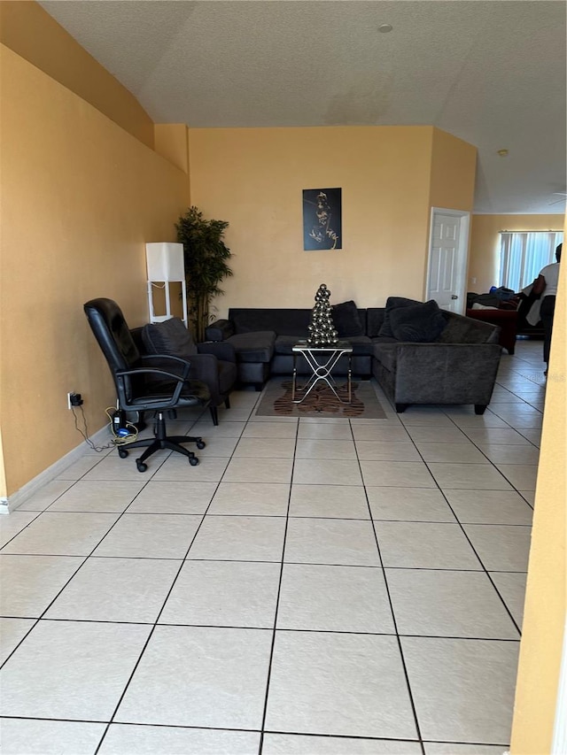 tiled living room featuring lofted ceiling