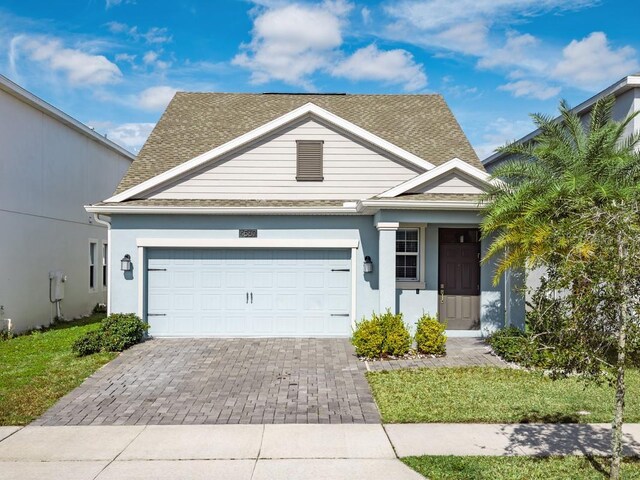 view of front of property featuring a garage