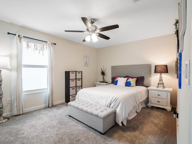 bedroom with ceiling fan and carpet