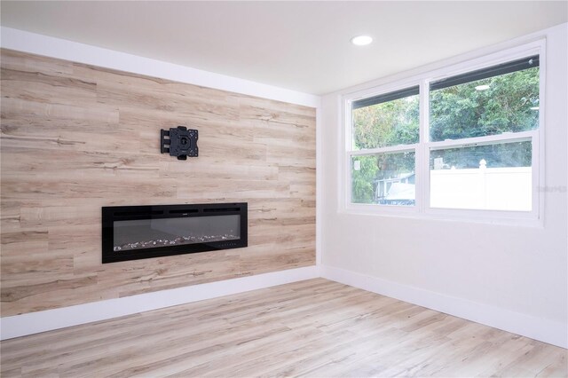 2002 Geigel Ave, Orlando, FL 32806 - interior details with recessed lighting, wood finished floors, baseboards, and a glass covered fireplace