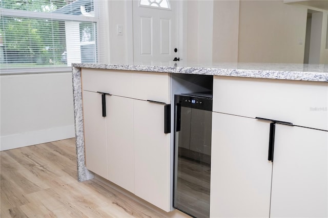 2002 Geigel Ave, Orlando, FL 32806 - detailed view of wine cooler, wood finished floors, and baseboards