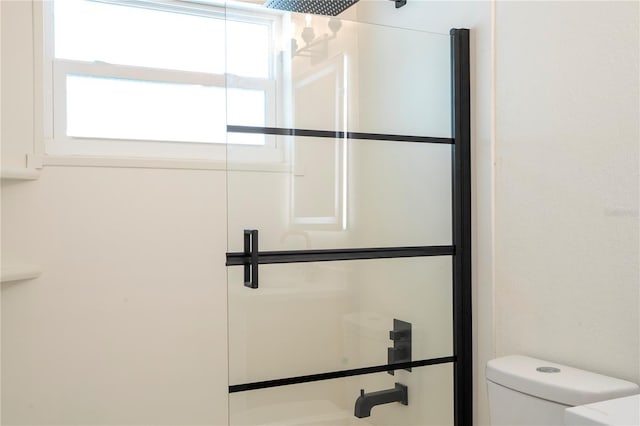2002 Geigel Ave, Orlando, FL 32806 - bathroom with toilet and a shower