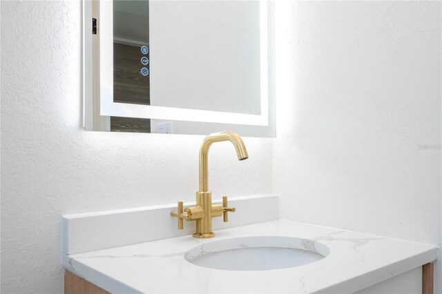 2002 Geigel Ave, Orlando, FL 32806 - interior space featuring vanity and a textured wall
