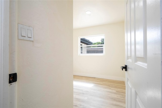 2002 Geigel Ave, Orlando, FL 32806 - hall with wood finished floors and baseboards