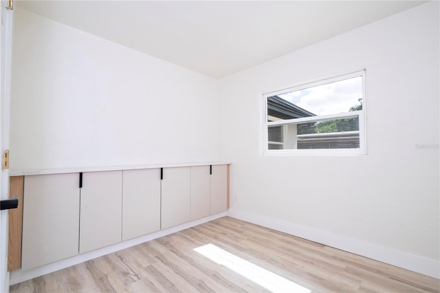 2002 Geigel Ave, Orlando, FL 32806 - empty room featuring light wood-style flooring and baseboards