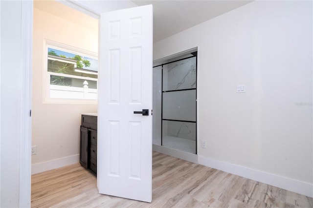 2002 Geigel Ave, Orlando, FL 32806 - interior space featuring light wood-style flooring and baseboards