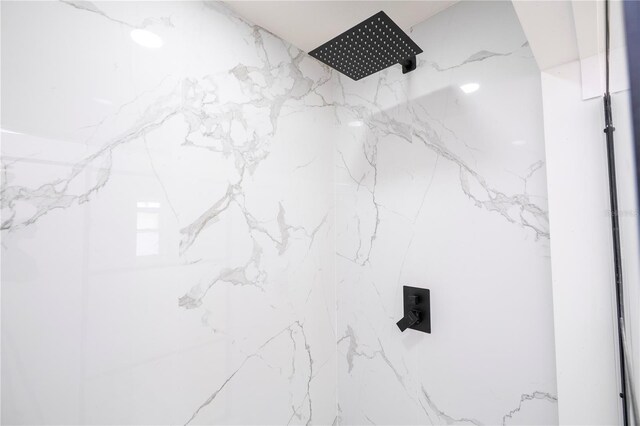 2002 Geigel Ave, Orlando, FL 32806 - bathroom with a marble finish shower