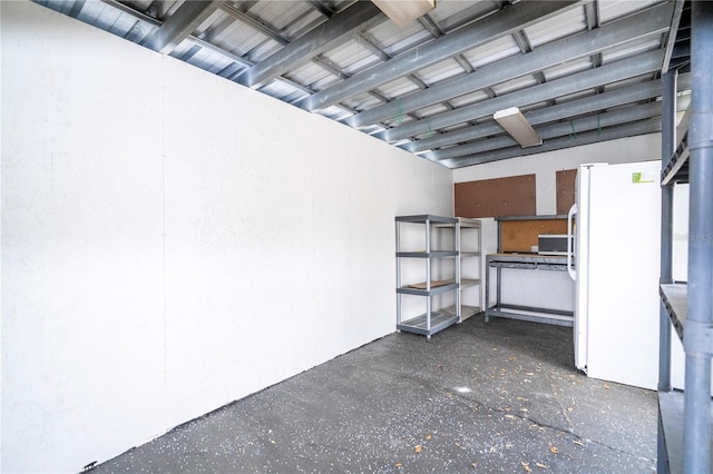 2002 Geigel Ave, Orlando, FL 32806 - garage featuring freestanding refrigerator