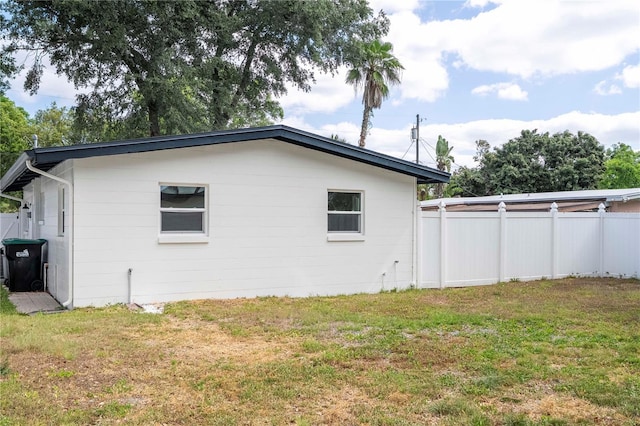 2002 Geigel Ave, Orlando, FL 32806 - view of property exterior featuring a yard and fence