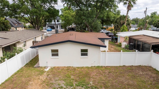 2002 Geigel Ave, Orlando, FL 32806 - rear view of property featuring a residential view