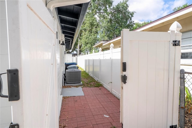 2002 Geigel Ave, Orlando, FL 32806 - view of property exterior featuring central air condition unit and fence