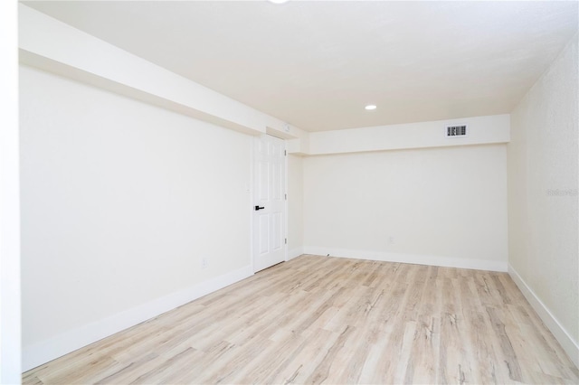 2002 Geigel Ave, Orlando, FL 32806 - spare room featuring wood finished floors, baseboards, and recessed lighting