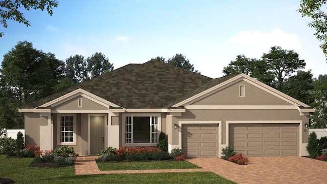 view of front of house featuring a front lawn and a garage