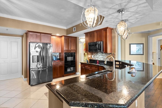 kitchen with pendant lighting, sink, decorative backsplash, stainless steel appliances, and crown molding