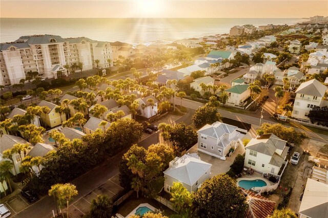 aerial view at dusk with a water view