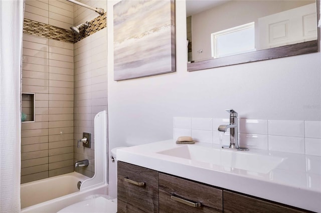 full bathroom featuring vanity, shower / tub combo with curtain, and toilet