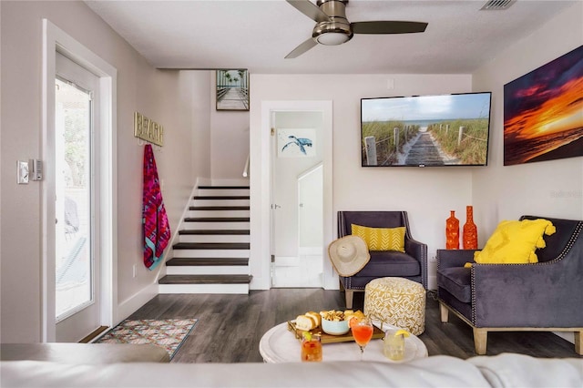 foyer entrance featuring ceiling fan and dark hardwood / wood-style floors