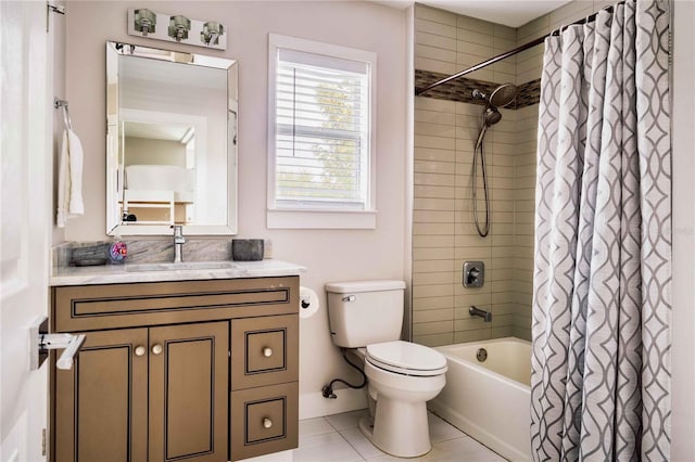 full bathroom with tile patterned flooring, vanity, shower / tub combo, and toilet