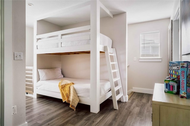 bedroom featuring dark hardwood / wood-style flooring