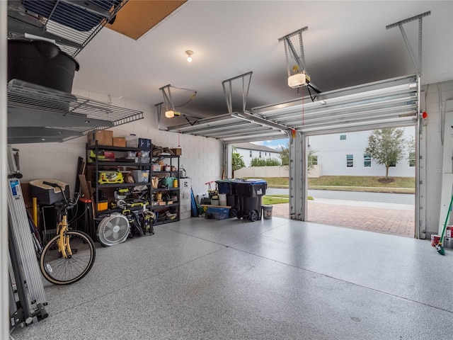 garage featuring a garage door opener