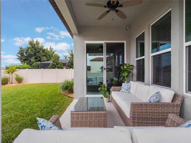 view of patio featuring an outdoor hangout area and ceiling fan