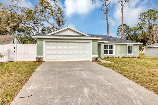 ranch-style house with a front lawn and a garage