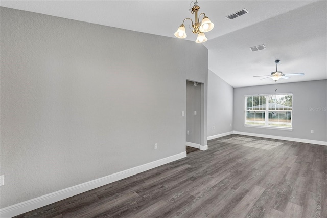 unfurnished room featuring dark wood-type flooring, lofted ceiling, and ceiling fan with notable chandelier