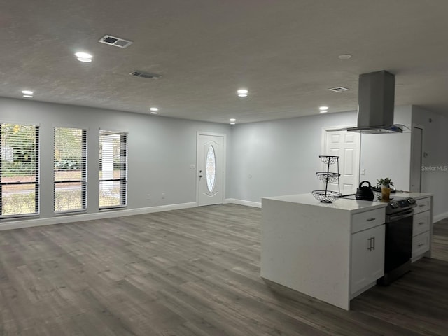 kitchen with a center island, wood-type flooring, white cabinetry, black range with electric stovetop, and island range hood