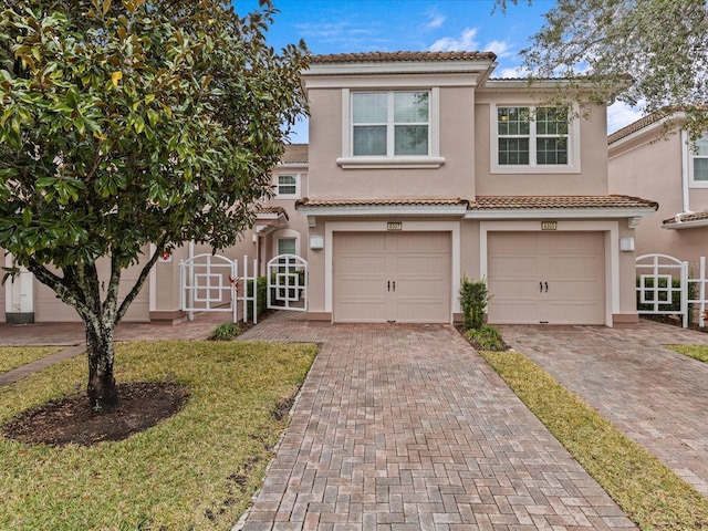 view of front of property with a garage