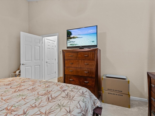 bedroom with light carpet