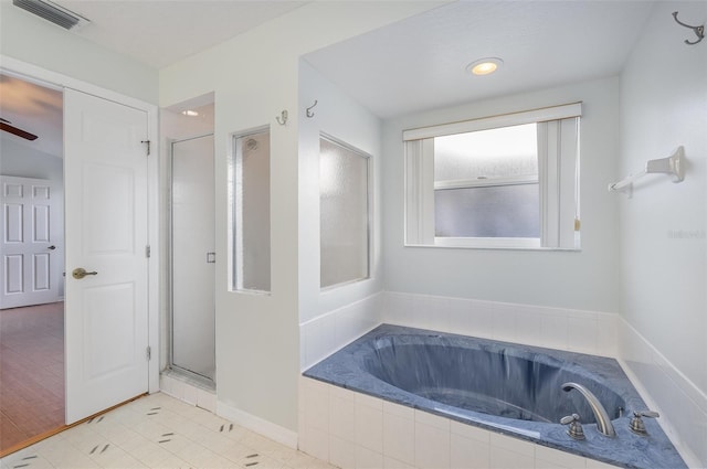 bathroom with independent shower and bath, tile patterned flooring, and ceiling fan